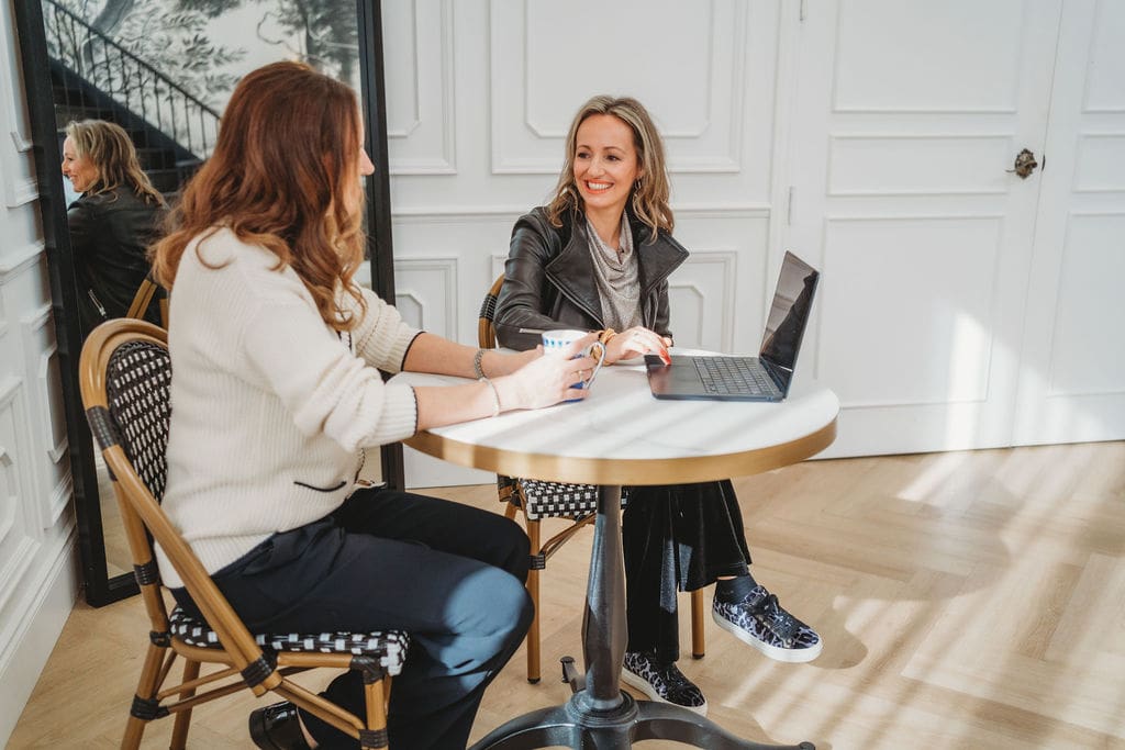 Justine meeting with a client